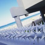 Double horizontal wall top spikes