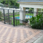 Swimming pool safety fence with swing gate